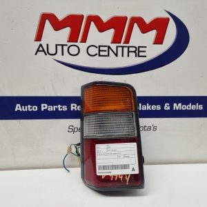MITSUBISHI L300 LEFT TAILLIGHT SJ-SK, BLACK SURROUND, 09/94-12/13 94 95 96 97 98