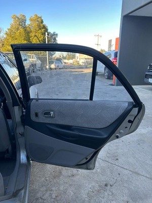 FORD LASER KN-KQ 02/1999-09/2002 RIGHT REAR INNER DOOR HANDLE LIGHT GREY BACKIN