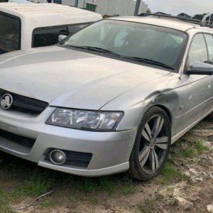 HOLDEN COMMODORE LEFT HEADLAMP VZ, ADVENTRA SX6/EXECUTIVE/ACCLAIM/EQUIPE, STANDA