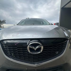 MAZDA CX5 KE 02/2012-12/2014 RADIATOR GRILLE WITH PARK SENSOR TYPE