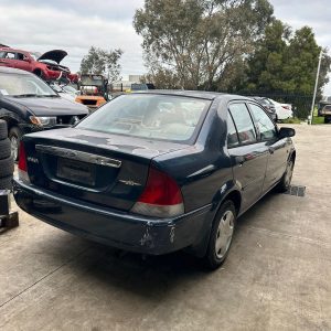 FORD LASER RIGHT TAILLIGHT KN, SEDAN, STANLEY LENS# R2271, P/N BK4M51150B, 02/99