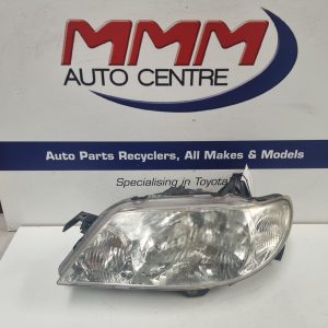MAZDA 323 LEFT HEADLAMP BJ, P/N BL2B510LOD, 03/01-12/03  01 02 03 04