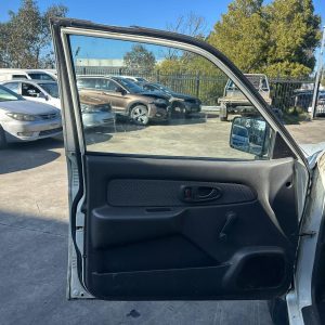 MITSUBISHI TRITON MK 10/1996-06/2006 LEFT FRONT DOOR TRIM MANUAL REG TYPE