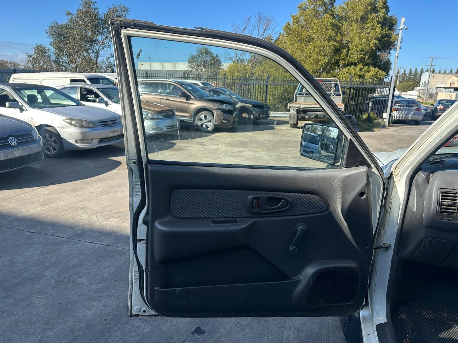 MITSUBISHI TRITON MK 10/1996-06/2006 LEFT FRONT DOOR TRIM MANUAL REG TYPE