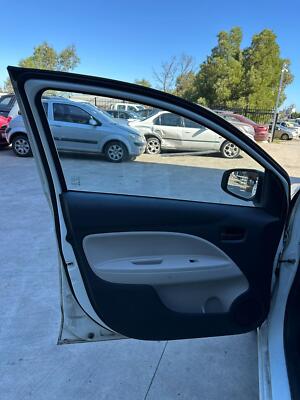 MITSUBISHI MIRAGE LA-LB 12/2012-12/2024 LEFT FRONT DOOR TRIM CLOTH