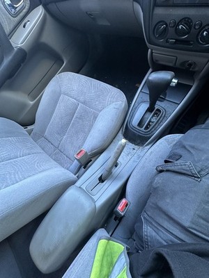 FORD LASER KN-KQ 02/1999-09/2002 CONSOLE LID