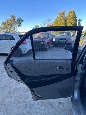FORD LASER KQ 04/2001-09/2002 LEFT REAR DOOR TRIM LXi TYPE SEDAN