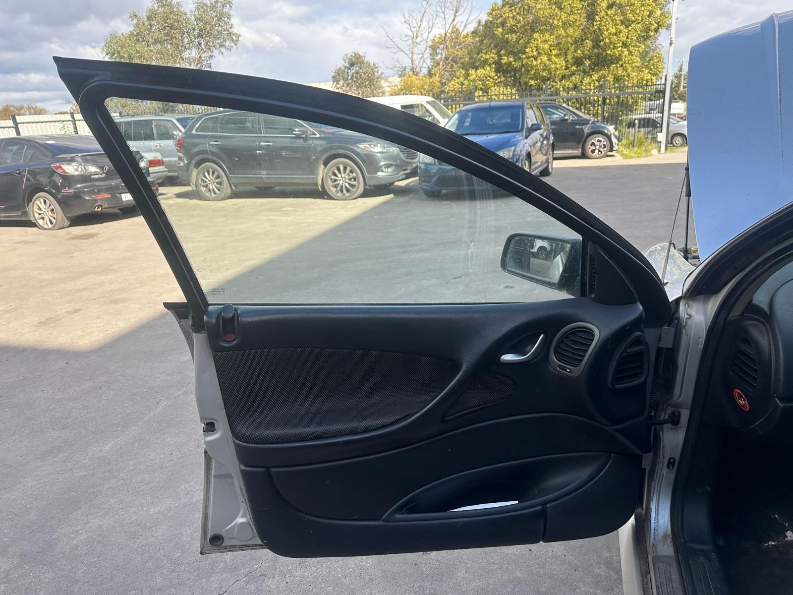 HOLDEN COMMODORE VY1-VZ 10/2002-09/2007 LEFT FRONT DOOR TRIM LEATHER