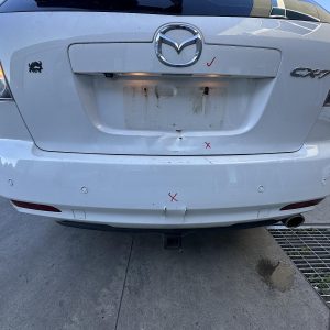 MAZDA CX7 ER 11/2006-02/2012 CENTRE REAR TAILGATE GARNISH