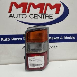 MITSUBISHI L300 RIGHT TAILLIGHT SJ-SK, BLACK SURROUND, 09/94-12/13 94 95 96 97 9