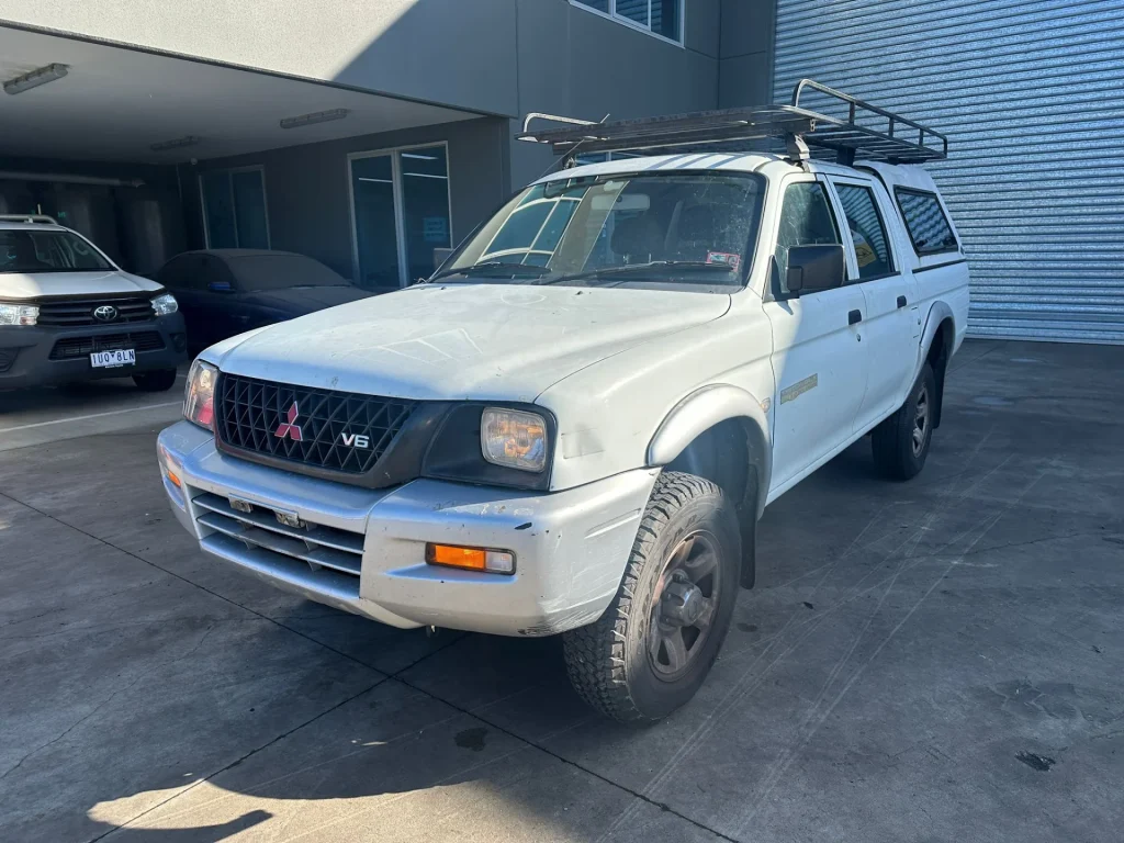 Mitsubishi Triton 2002 White Manual Petrol